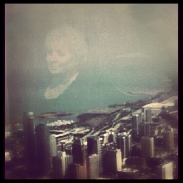 My mom's reflection captured in the glass while standing at the top of the Sears Tower in Chicago, IL.