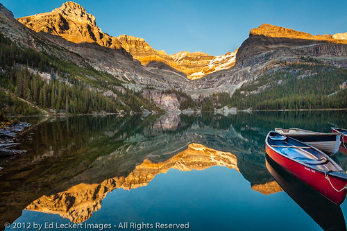Lake O'Hara Sunset, Yoho National Park, British Columbia by edleckert, The sun sets on the mountains surrounding Lake O'Hara as canoes by the dock await their next journey