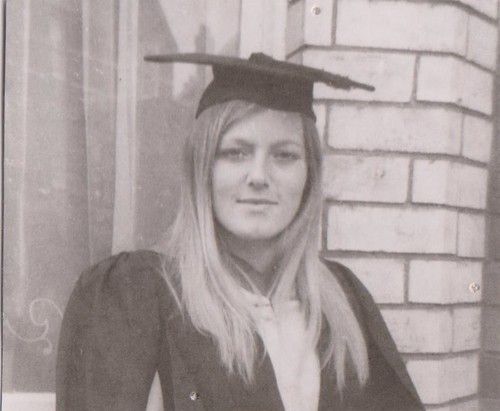 Gillian Ford practices her graduation on the steps of her student flat, 1971
