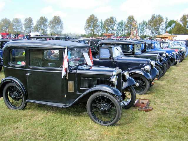 An large array of vintage Austin cars