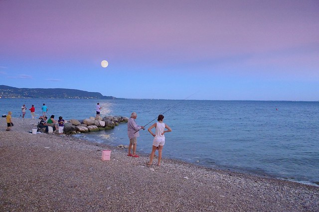 Fishing by moonlight at Lake Garda