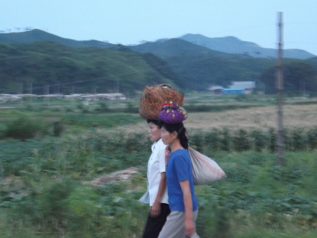 Carrying goods on her head