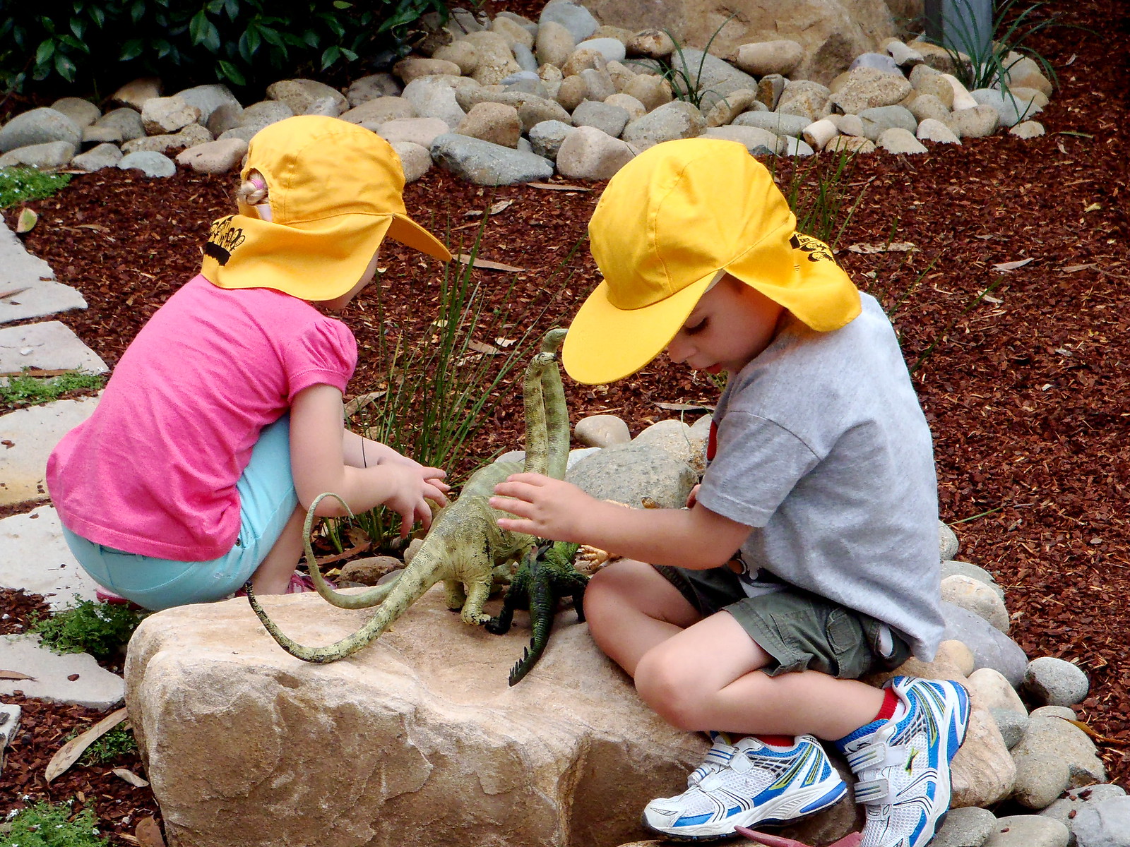 playing together with the dinosaurs