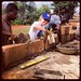 Our volunteer Sue Hillman lays blocks to the new school we are building in Abenta Village, Ghana.