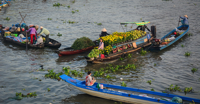 Wooden boats on Mekong River in Southern Vietnam
