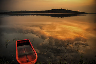 Red boat in the lake