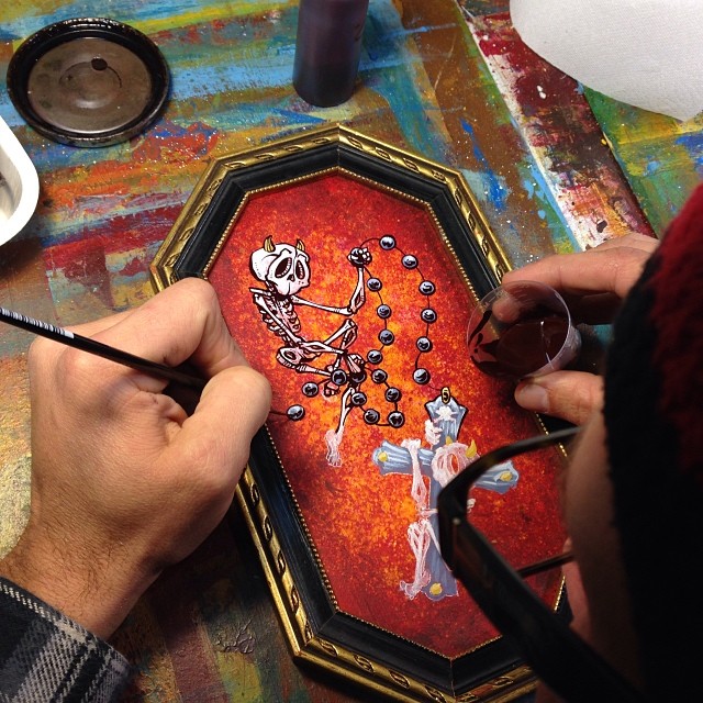 Back to work on my small painting that I started in San Diego today...skellies love their rosaries