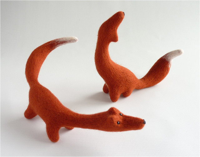 Pair of needle felted foxes