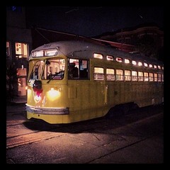 F Market Yellow Trolley Waits in the Castro