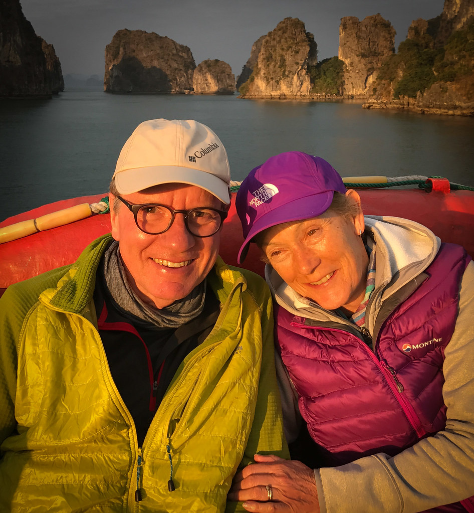 Us on deck watching the sun go down over Halong Bay