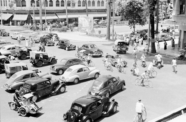 1950 - Bicycle and car traffic in Saigon - Photo by Harrison Forman