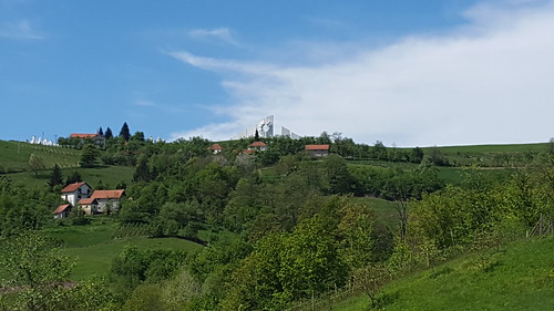 Kadinjača spomenik by SpomenikDatabase, A view from a distance as you approach the Kadinjača spomenik complex from coming up the mountains f
