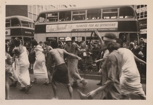‘Slaves’ from Murray House drag their float from the Rag Procession 1969