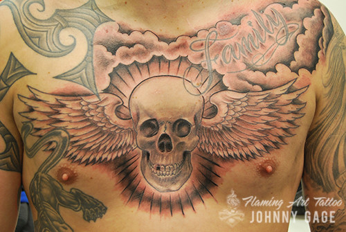 skull and wings tattoo on chest | john gage | Flickr