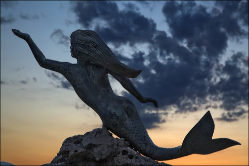 sunset art statue port island greece mermaid cyclades poros
