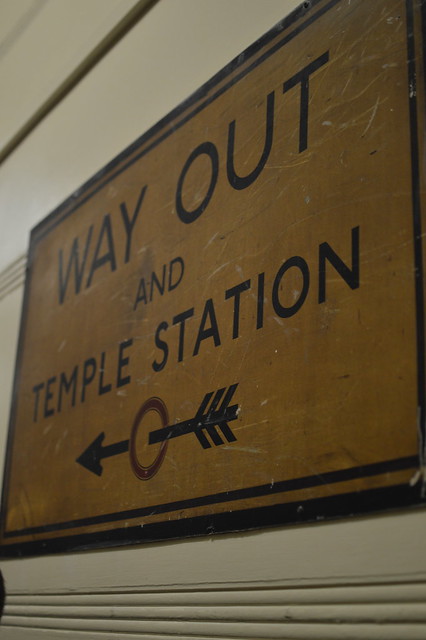 Way Out and Temple Station Sign