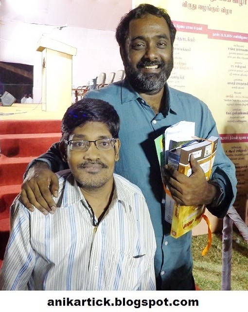 Animation Artist ANIKARTICK with Popular Painter SRIDHAR at CHENNAI BOOK FAIR 2014,Nandanam YMCA Ground,ThenaamPettai,Mount Road,Chennai,Tamil Nadu,India