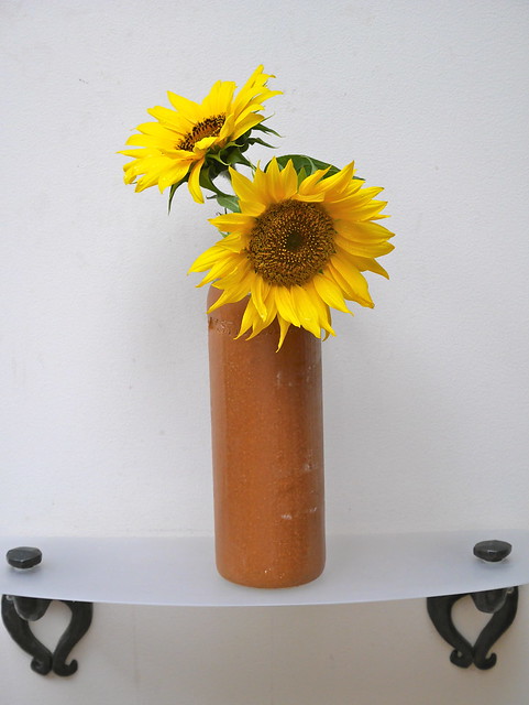 sunflowers in clay May Wine bottle