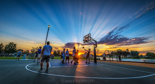 Dunks at Dusk by Michael Filippoff, A wonderful sunset as the sun made its way past a low-level cloud, casting beautiful rays of light a