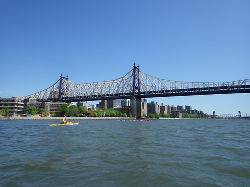 Closer view of the 59th St. Bridge. Roosevelt Island in the background. Current's especially strong in here because Roosevelt squeezes the river down into two narrow channels. | by bkfrogma