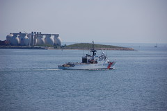A coast guard ship and water treatment plant at Deer Island