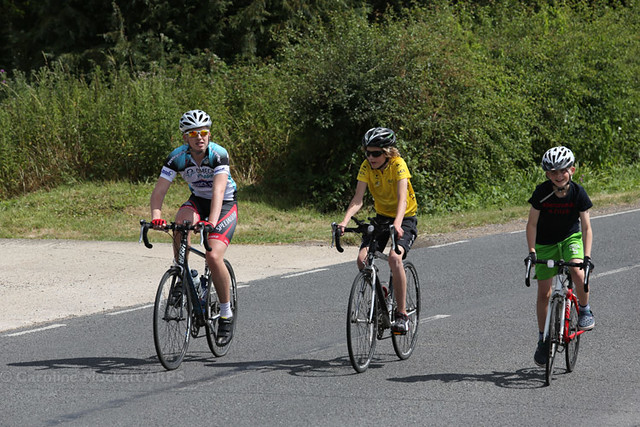 Three Young Riders On The Course