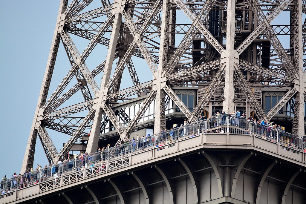 part of Eiffel Tower with numerous tourist on it | x76882 | Flickr