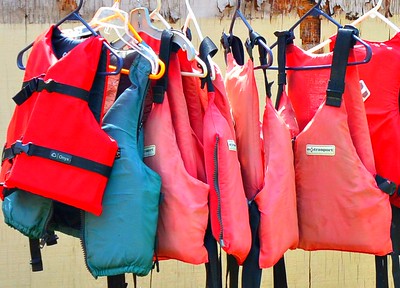 Personal Flotation Devices on hangers