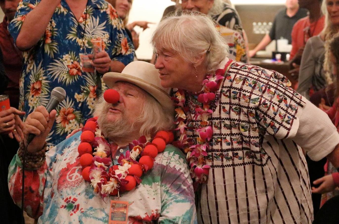 Seva co-founders Wavy Gravy and Jahanara Romney say a few words during the VIP after show reception.