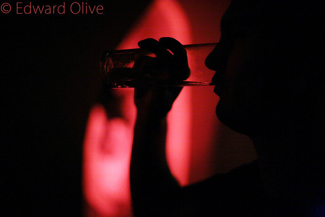 Man drinking in bar © 2006 Edward Olive photographer