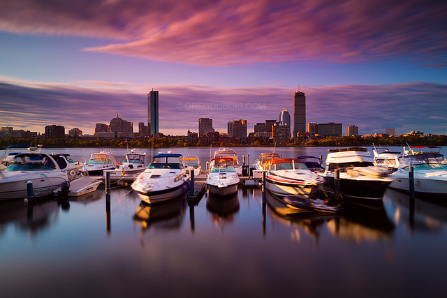 Golden Light Sunrise over Back Bay Boston Skyline and Charles River Yacht Club, Cambridge MA USA