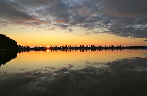 Setting Sun and Painterly Clouds Mirrored on a Tranquil  Kachemak Bay Inlet Kenai Peninsula Alaska by In Memoriam Ngaire Hart, travel trees sunset sea summer usa reflection nature beauty silhouette alaska clouds reflections lan