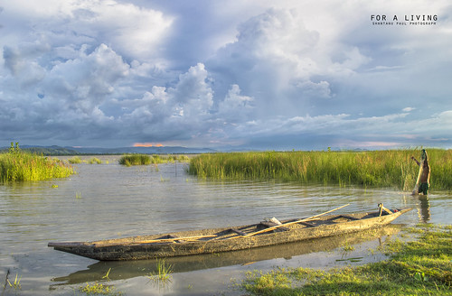 green beach clouds river boat fishing village riverside flood bank tribal monsoon assam northeast guwahati villager gillnet assamese bramhaputra