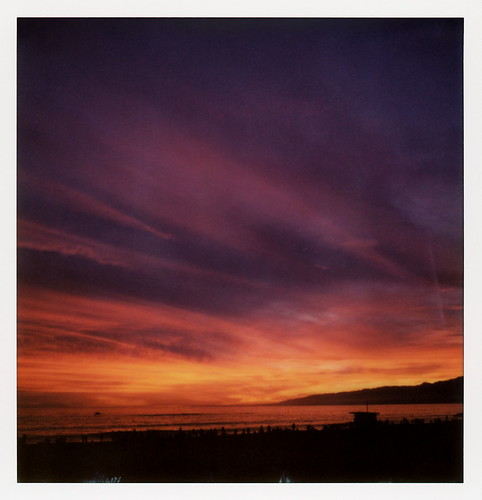 the impossible project tip polaroid slr680 frankenroid sx70 door rollers film for 600 type cameras instant roidweek roid week polaroidweek spring april 2017 end of trail sunset route 66 santa monica california ca pier lifeguard hut people boat silhouette glow beach bay mountains pacific ocean red orange purple pink clouds cloudporn reflection 031017 cromwalk polawalk day6 toby hancock photography