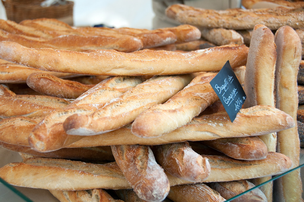 baguettes at the Edgar Quinet market | Paul Asman and Jill Lenoble | Flickr