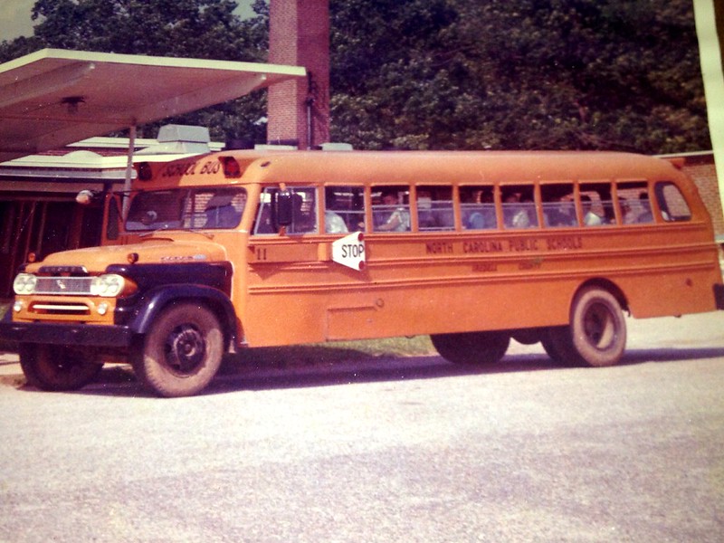 BLUE BIRD SCHOOL BUS, 1960 Dodge, NC.  Omaha Orange.  Digitized from print.