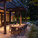Outdoor dining area at dusk. Lighting by Outdoor Illumination Inc. Photo credit: David Burroughs