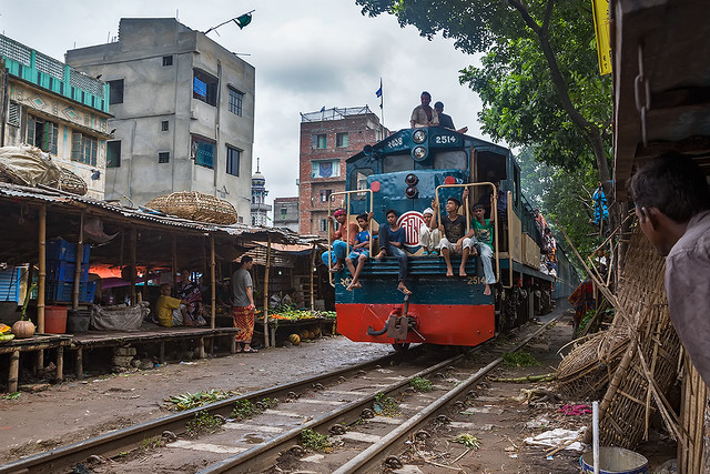 Train through a shanty town in Dhaka, Bangladesh.