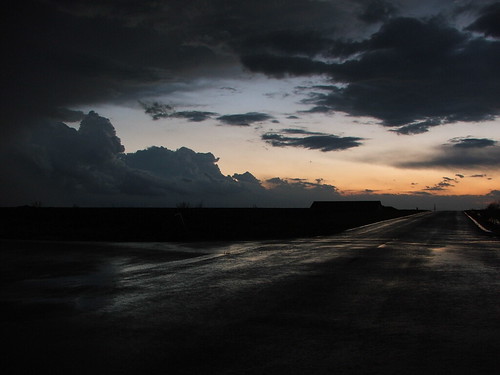 leessummit sunset road clouds