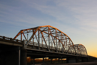 Truss bridge at sunset