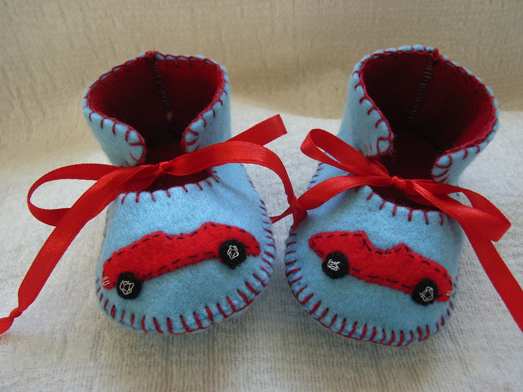 light blue and red handmade baby booties with red cars mot… | Flickr