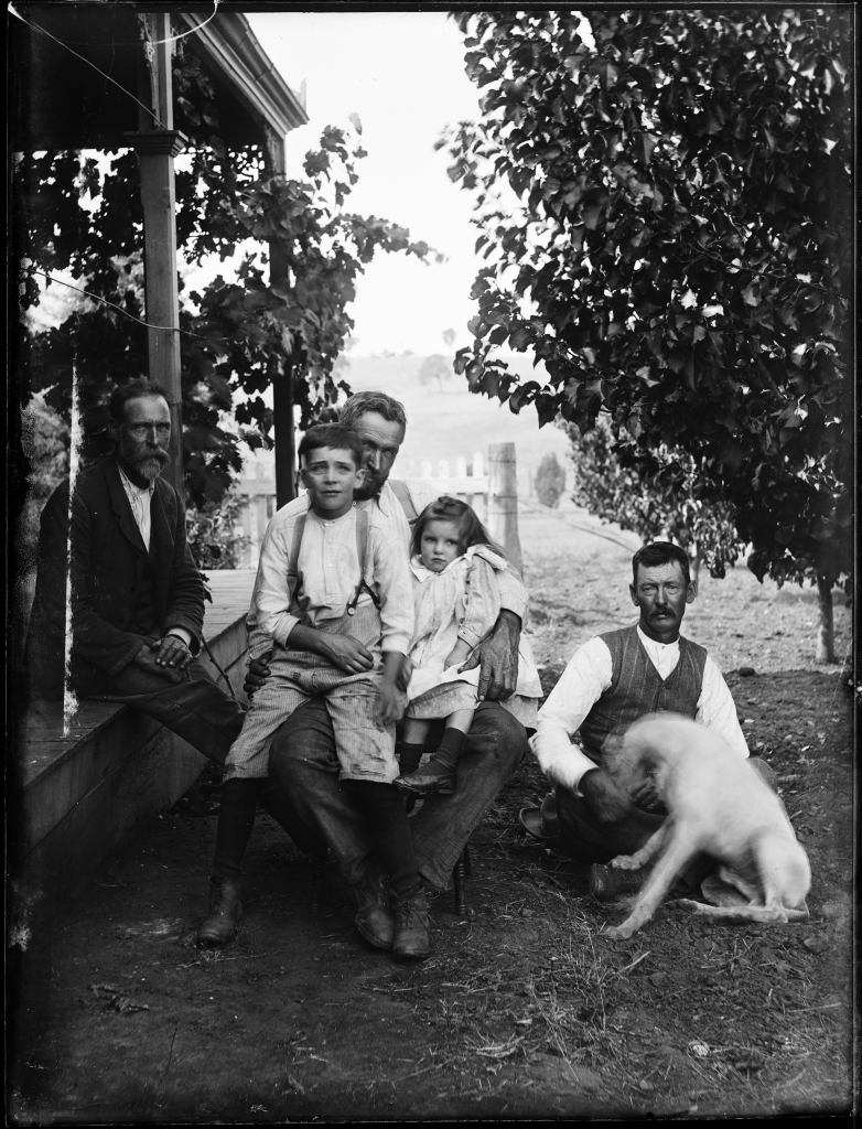 View of three men, two children and a dog | Format: Glass pl… | Flickr