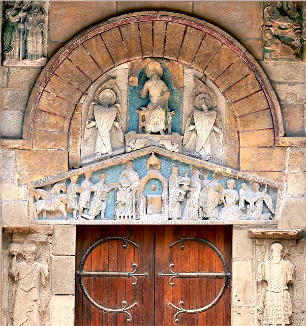Main entrance of the roman basilica of the Notre Dame Du Port, Clermont Ferrand, Auvergne, France - Classified in 1998 by UNESCO, as world heritage