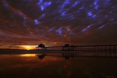 california sunset usa reflection silhouette landscape geotagged photography smithsonian photo photocontest huntingtonbeach stormclouds smithsonianchannel aerialamerica
