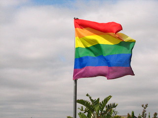 Rainbow flag flapping in the wind | by @bastique