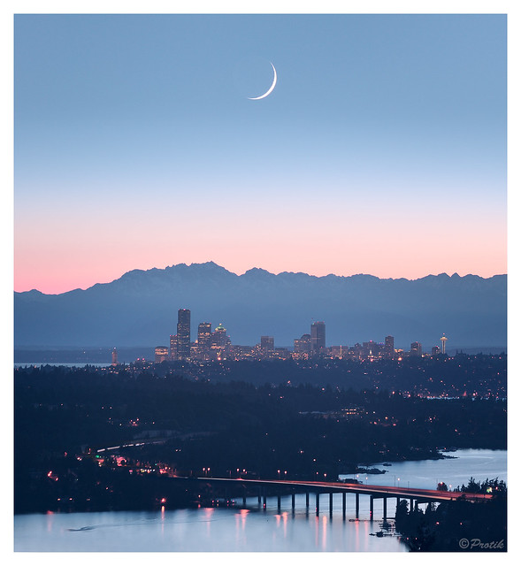 Crescent moon over Seattle