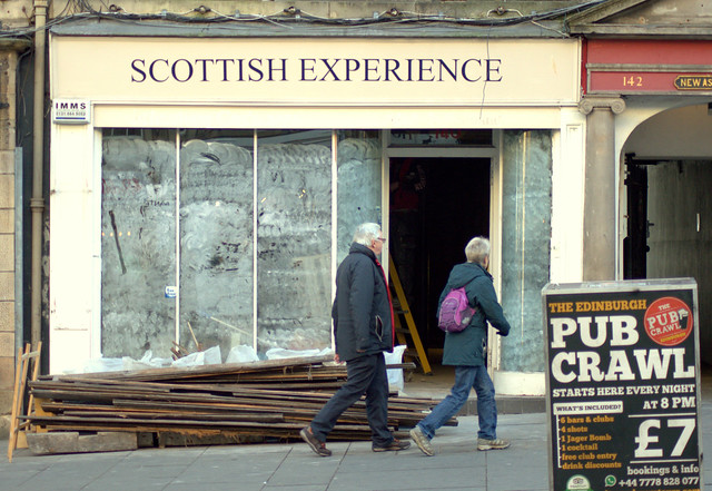 People outside Edinburgh shop fronts - the Scottish Experience