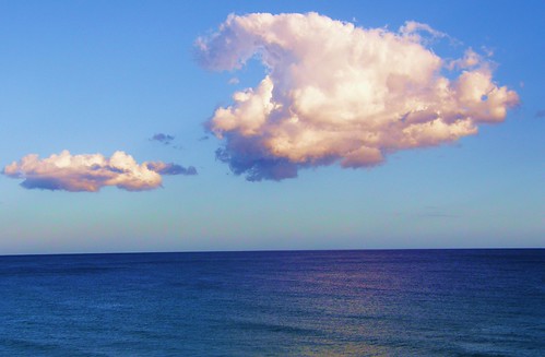 Single Cloud over the beach of Tsoutsouras in Greece..