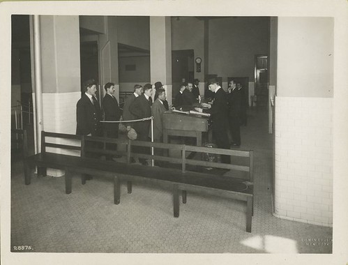 Immigrants waiting in line for processing by Immigration Bur... | by New York Public Library