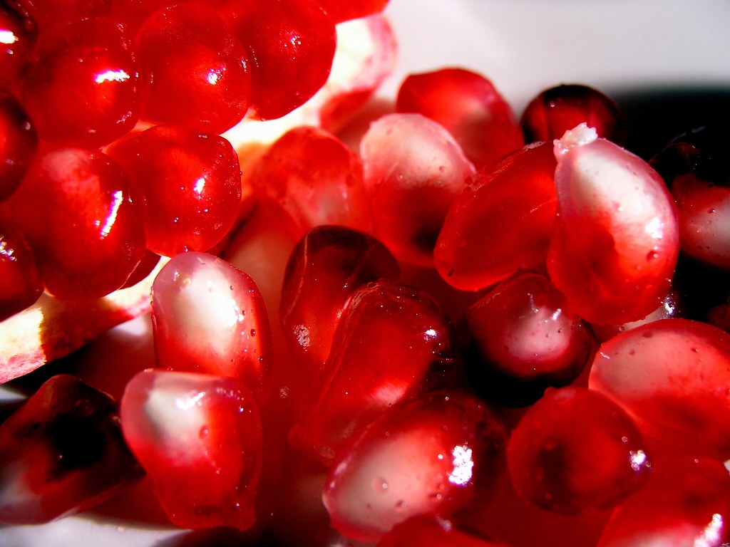 pomegranate seeds in sunlight